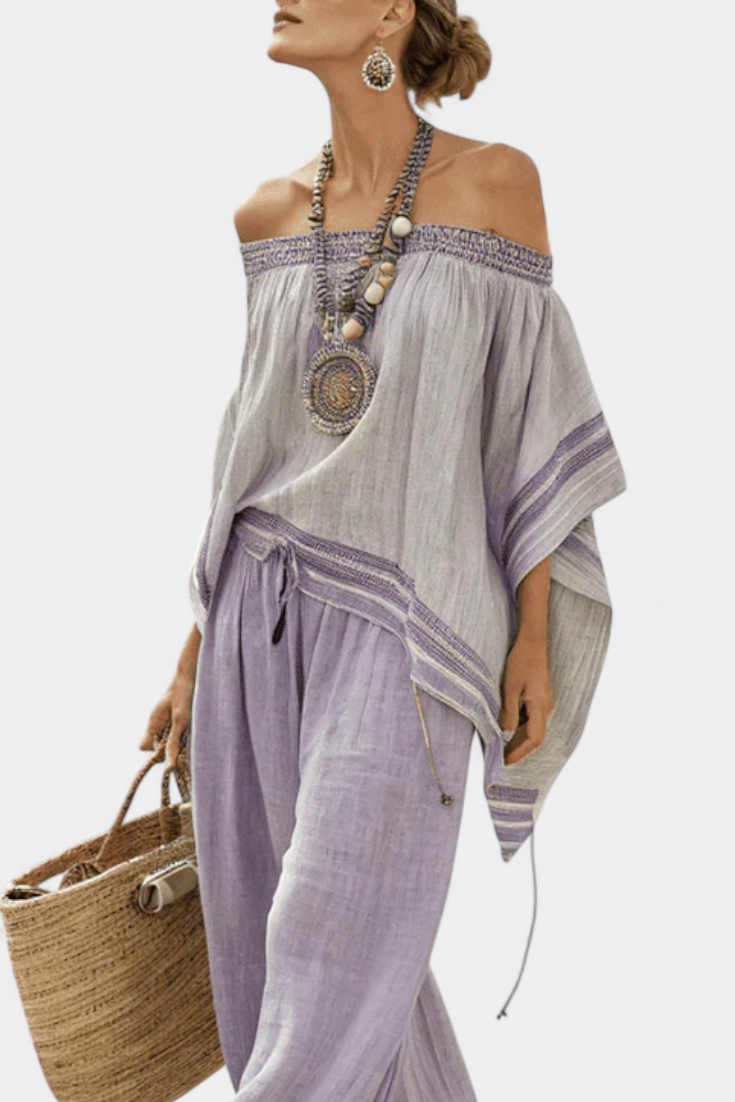 Zoe | Top elegante con hombros descubiertos y pantalones anchos a rayas
