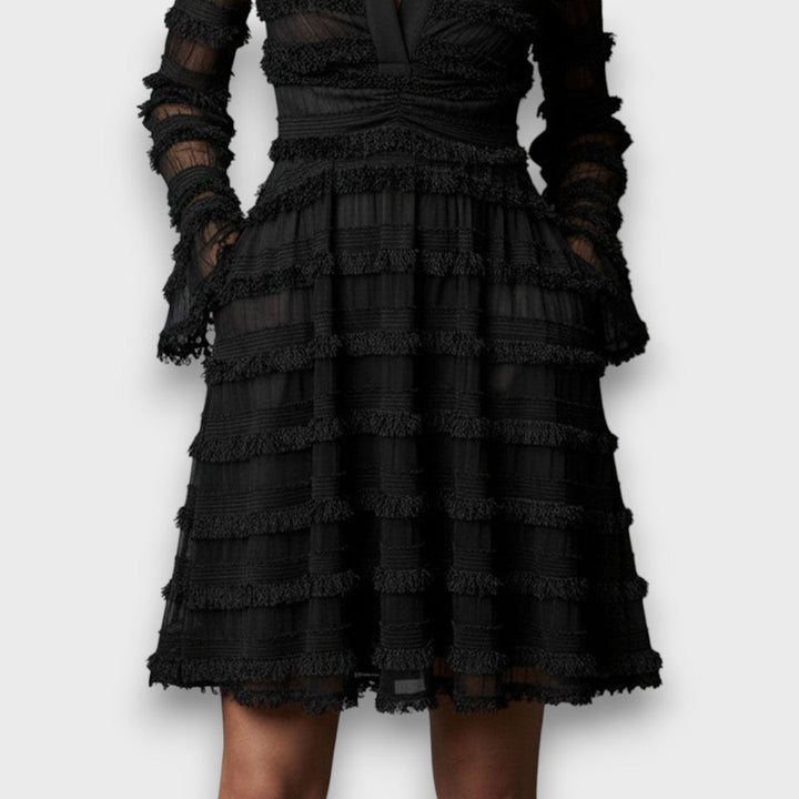 Vestido con flecos transparentes