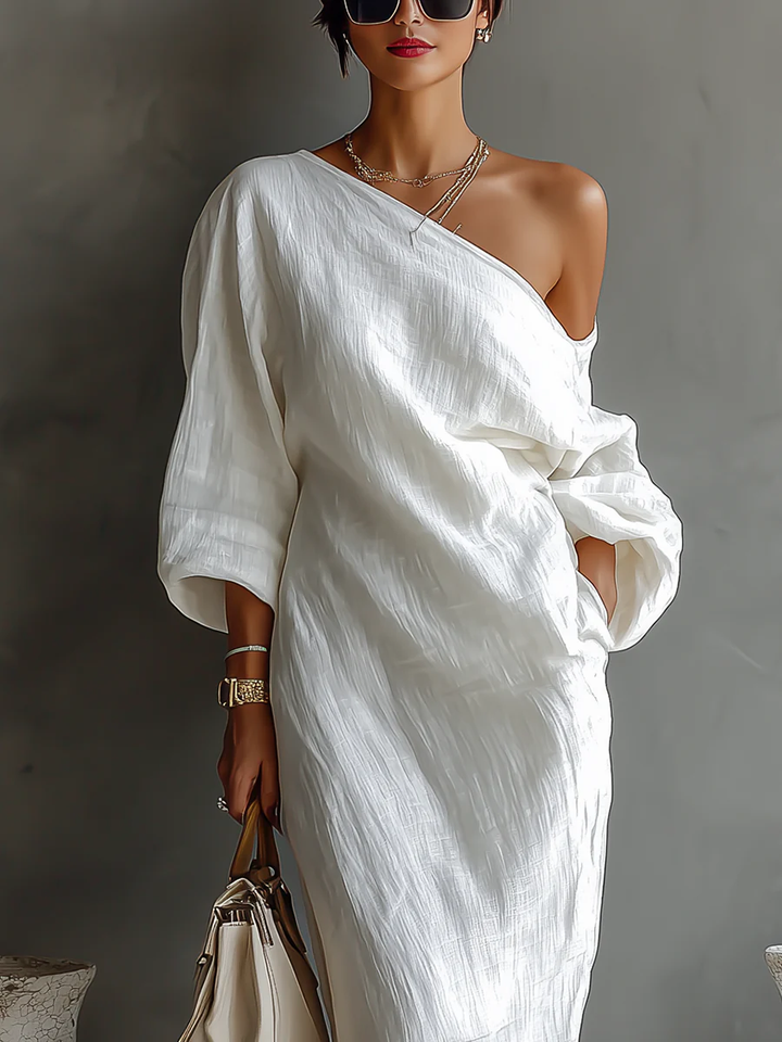Vestido largo elegante y fluido con un solo hombro